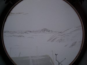 A view through the MDRS porthole during winter